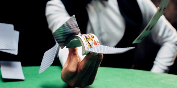 croupier dealing cards correctly
