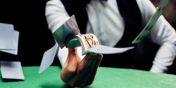 croupier dealing cards correctly