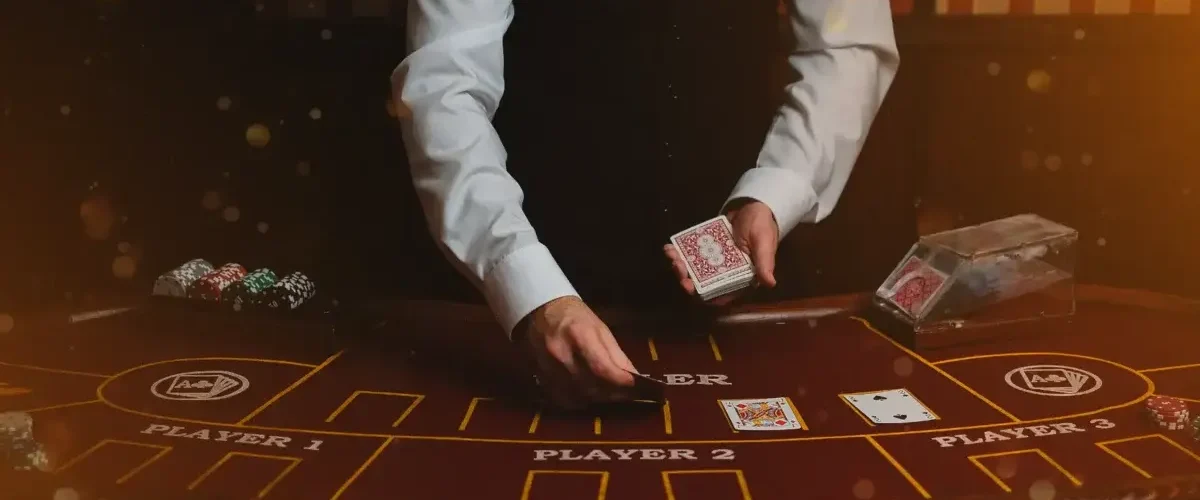 casino dealer at the table