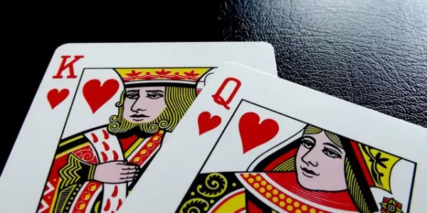 two playing cards laid on a table