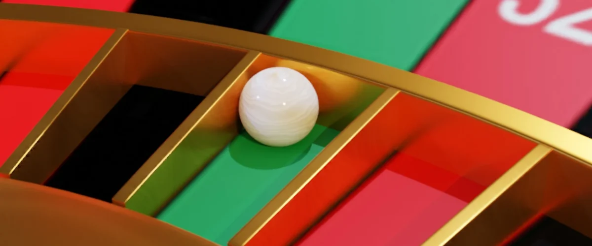 Roulette ball in the zero pocket.