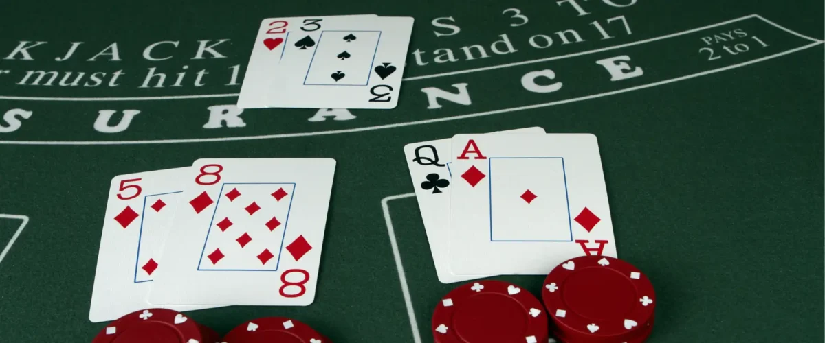 blackjack hands on a table