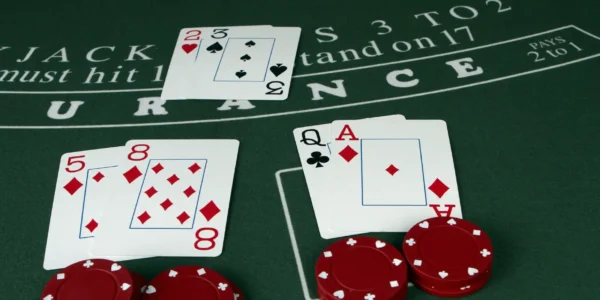 blackjack hands on a table